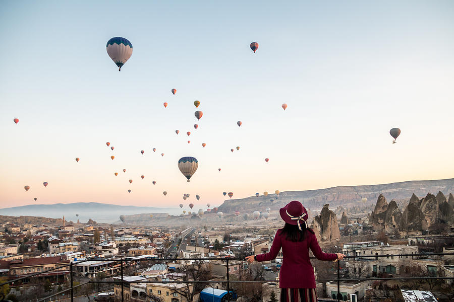 Woman Watching Hot Air Balloons in Cappadocia Photograph by Melissa Tse