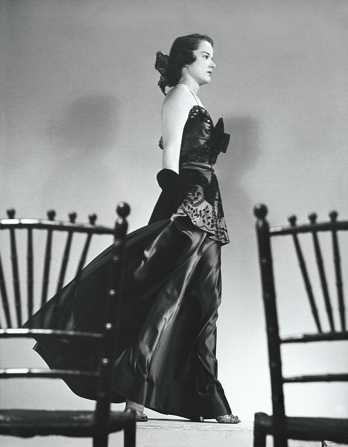 Woman Wearing An Evening Gown Photograph by John Rawlings