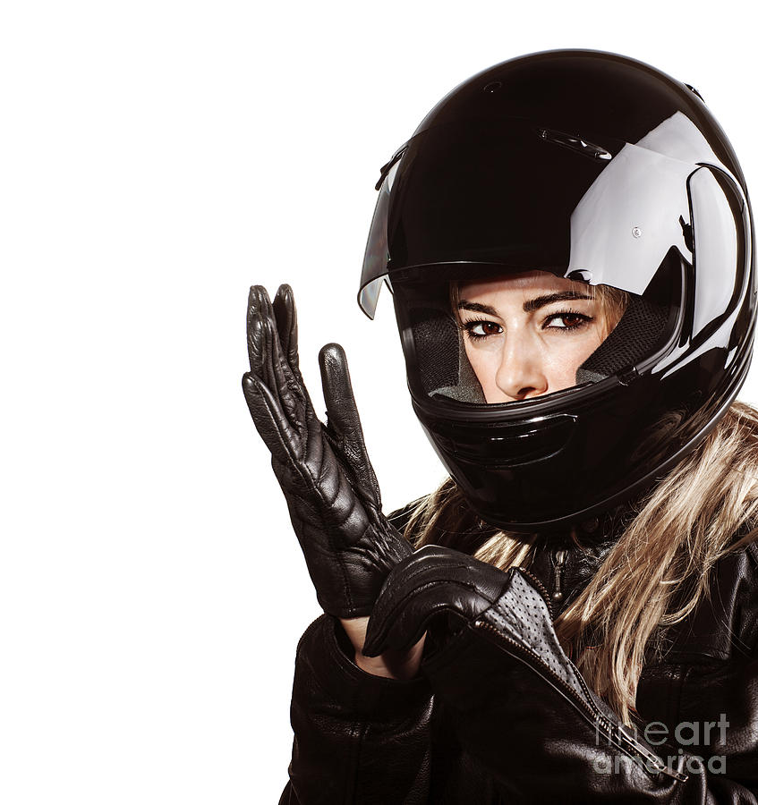 Portrait Photograph - Woman wearing motorsport outfit by Anna Om