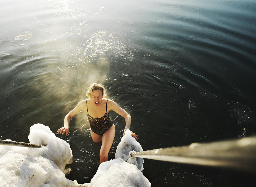 Woman winter bather during an early morning swim. Photograph by David Trood