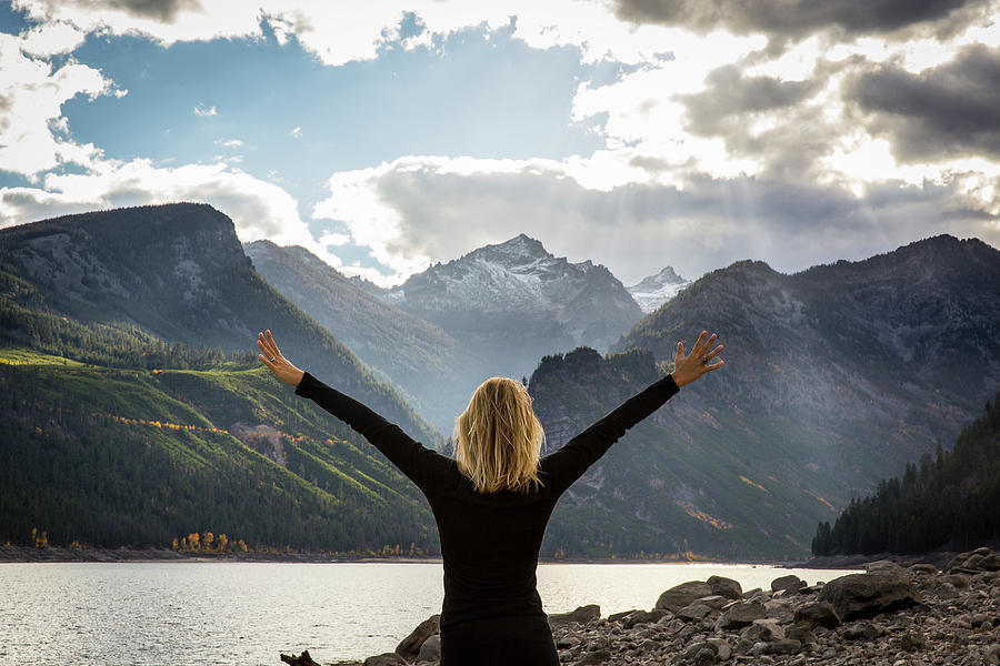 Woman With Arms Outstretched Photograph by Cameron MacPhail