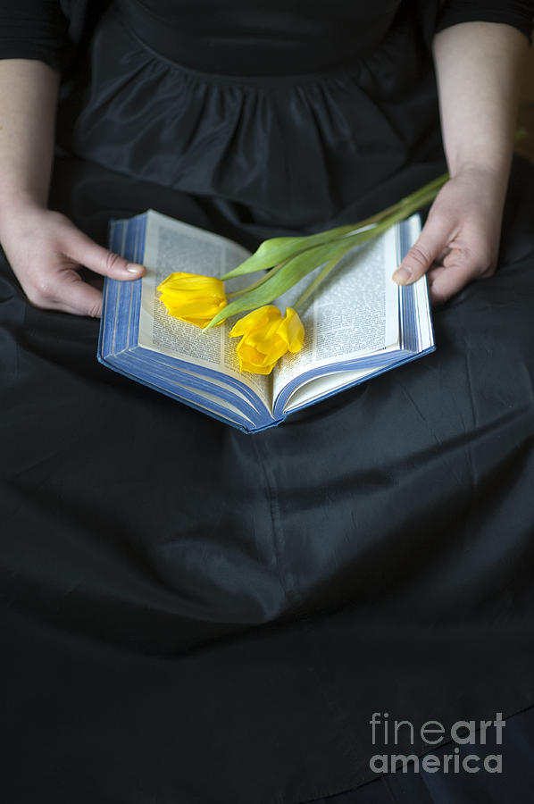 Woman With Bible And Yellow Tulip Photograph by Lee Avison