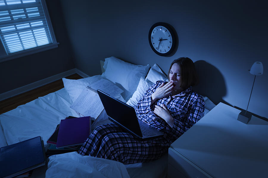Woman with Insomnia, College Student in Bed Working on Computer Photograph by YinYang