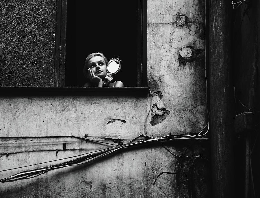 Woman With Mirror In Window Photograph by Pawel Wewiorski