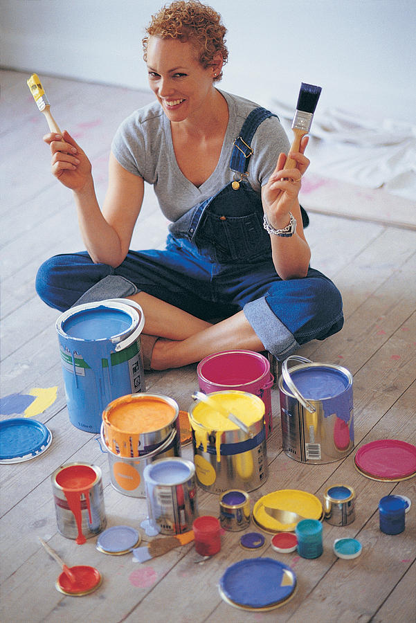 Woman With Paint Brushes and Paint Photograph by Digital Vision.
