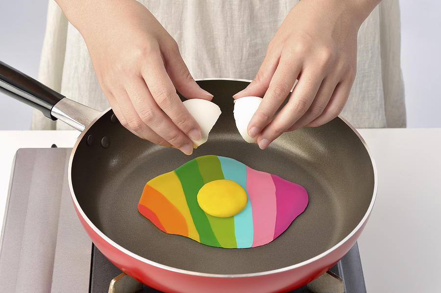 Women bake in a frying pan Colorful Egg Photograph by Yagi Studio