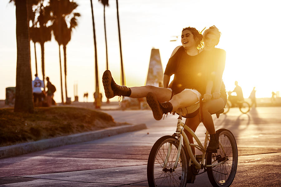 Women Couple Biking Photograph by Lise Gagne