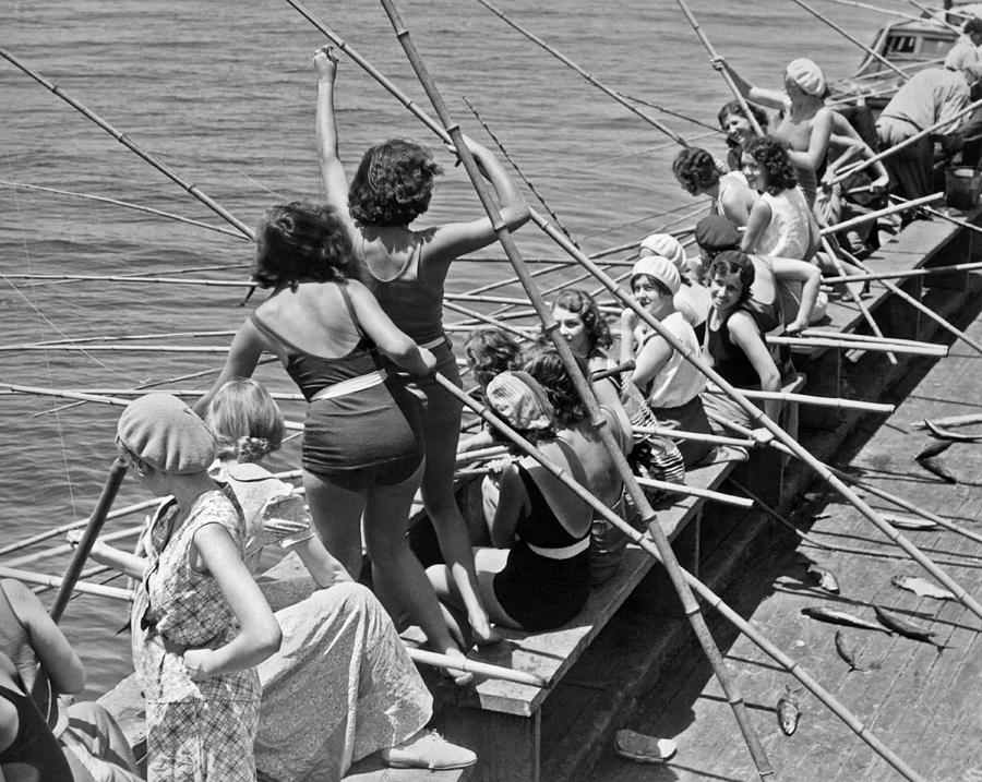 Women Fishing With Cane Poles Photograph by Underwood Archives