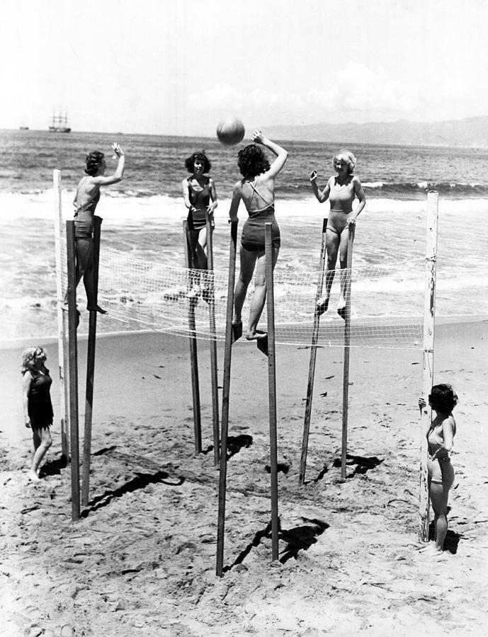 Women On Stilts Photograph by Retro Images Archive