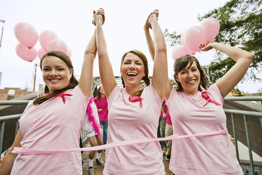 Women run in breast cancer marathon Photograph by AE Pictures Inc.