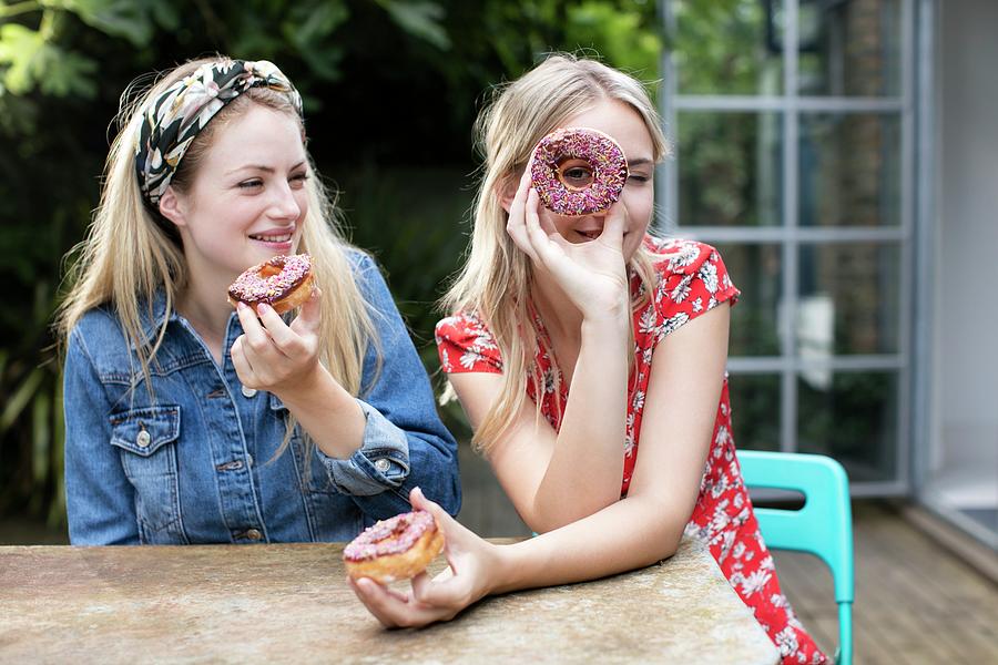 Women With Doughnuts Photograph by Science Photo Library - Fine Art America