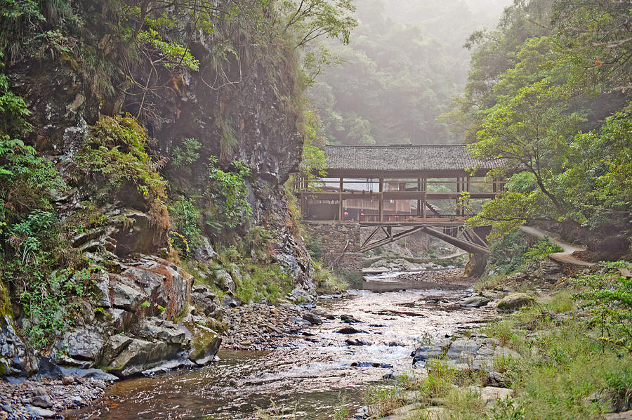 Wooden Bridge in the forest Guilin mountains China Photograph by Marek Poplawski