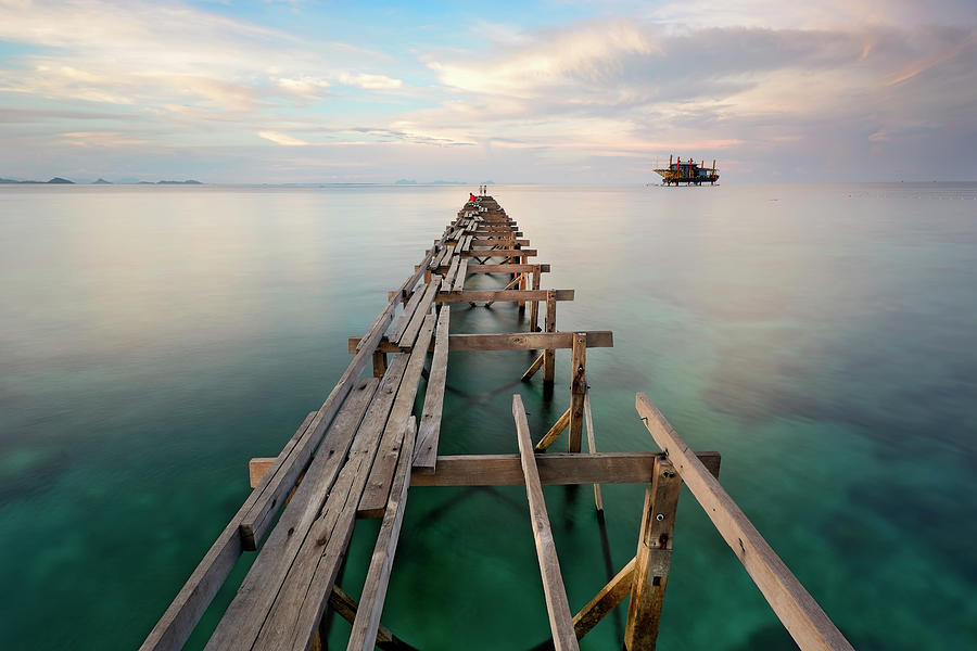 Wooden Bridge In The Port Between Sunset Photograph by Tuah Roslan