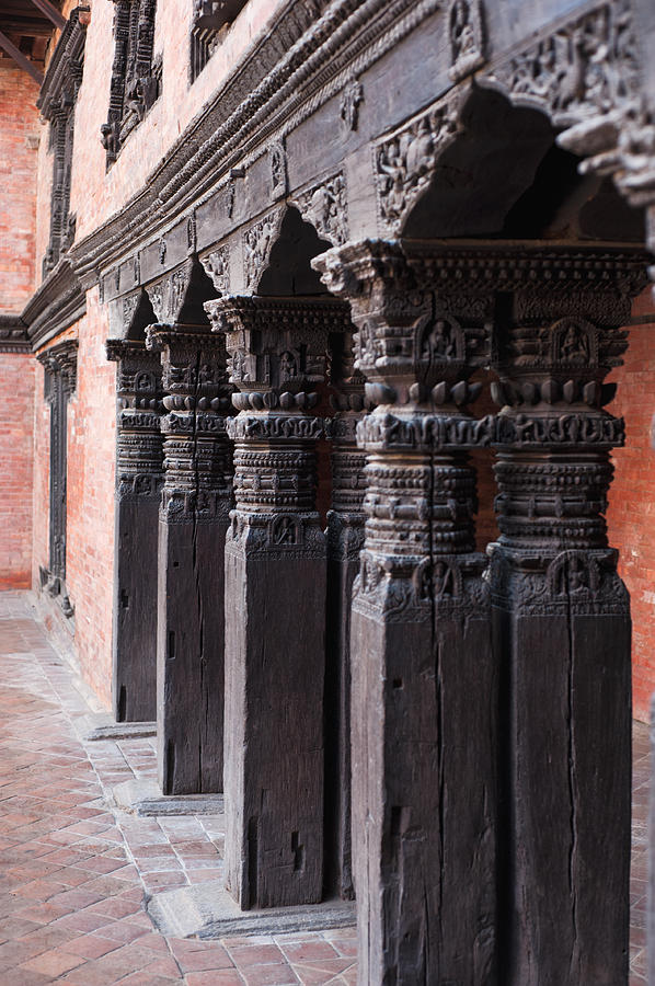 Wooden Column at Durbar Square Photograph by U Schade