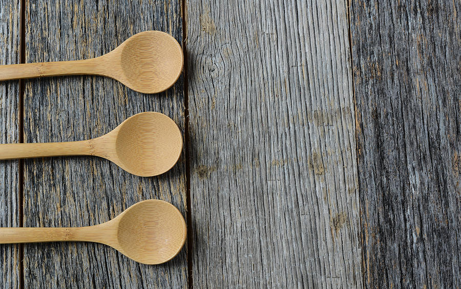 Spoon Still Life Photograph - Wooden Cooking Spoons on a Rustic Wood Background by Brandon Bourdages
