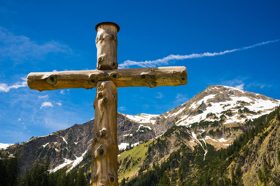 Wooden cross in the mountains Photograph by Matthias Hauser