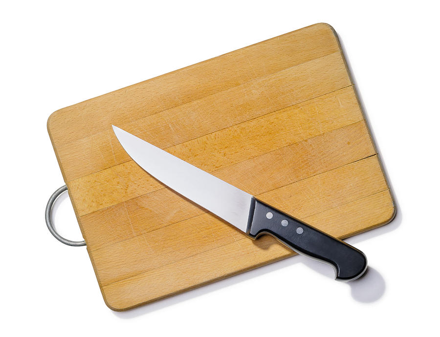 Wooden Cutting Board With Kitchen Knife Photograph by Alain De Maximy