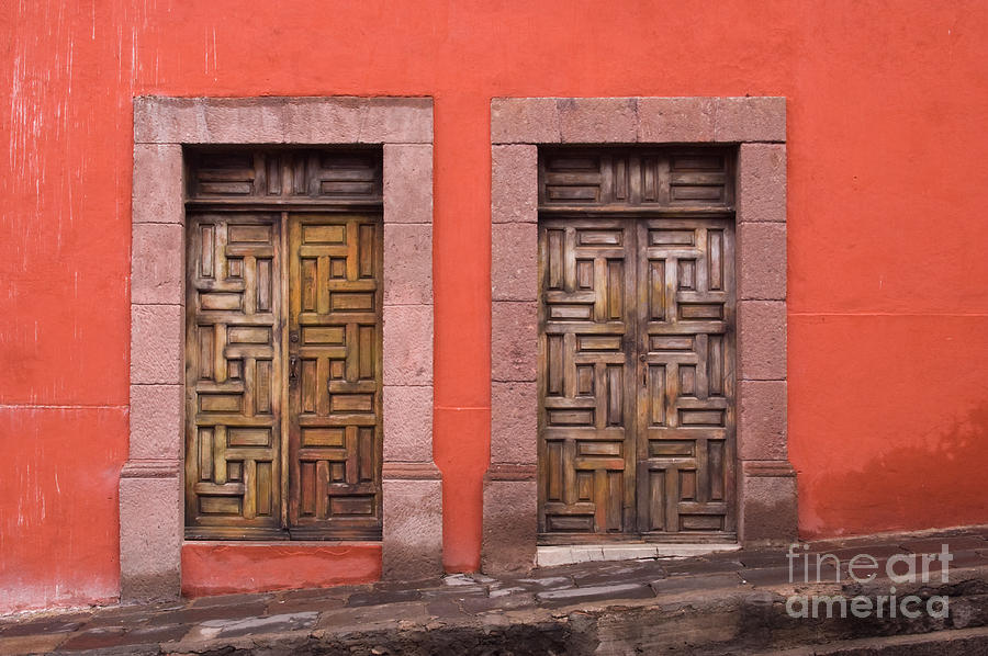 Wooden Doors on Orange Wall Photograph by Oscar Gutierrez