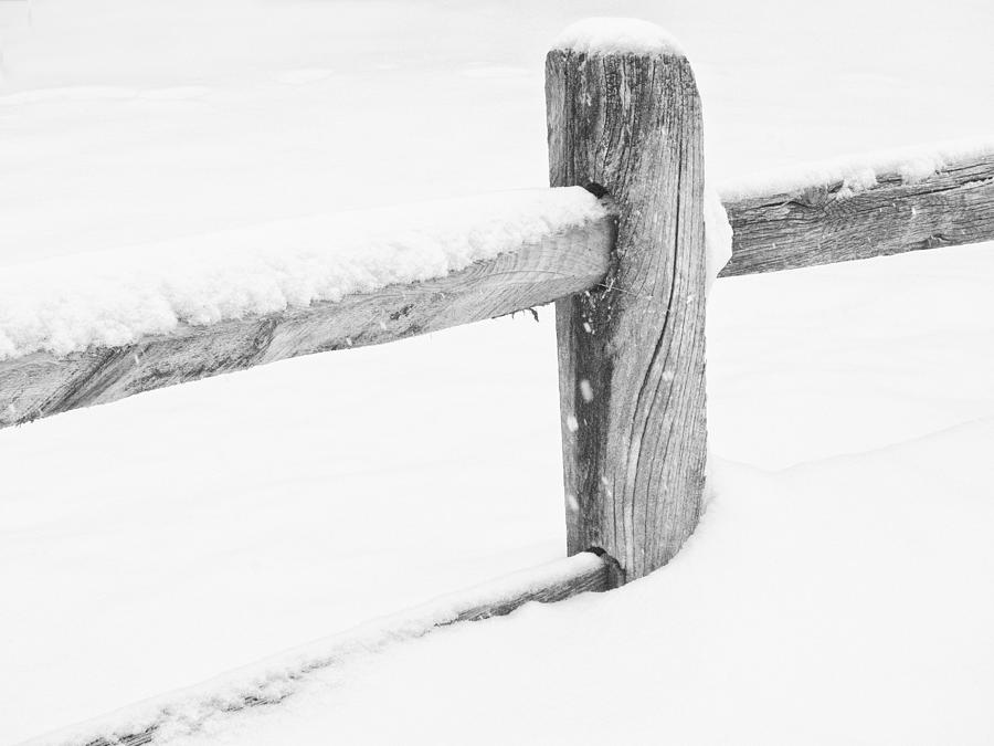 Wooden Fence in the Snow Photograph by Nancy De Flon