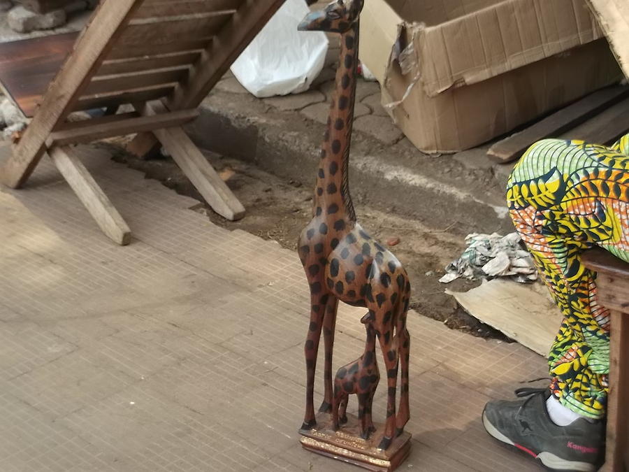 Wooden Giraffe Sculpture by Hilary Bime
