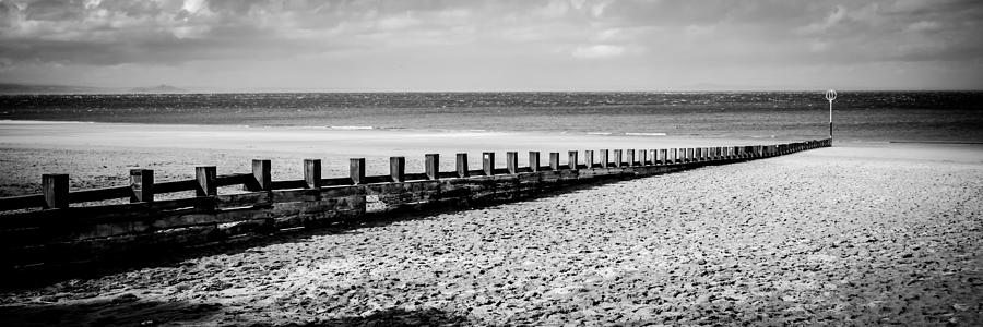 Wooden Groyne Photograph by Max Blinkhorn