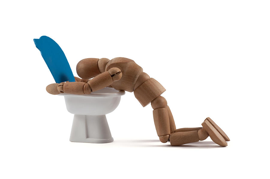Wooden Mannequin Vomiting Photograph by Kerrick