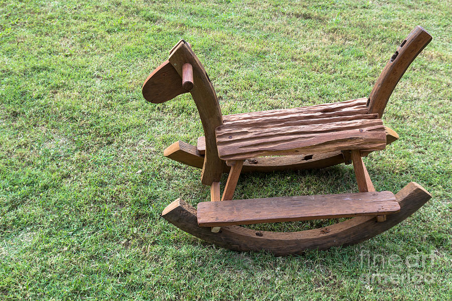 Wooden rocking horse Photograph by Tosporn Preede