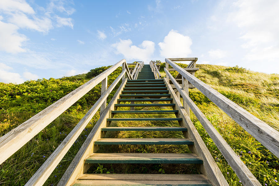 Wooden stairway uphill, Sylt island. Photograph by © Marco Bottigelli