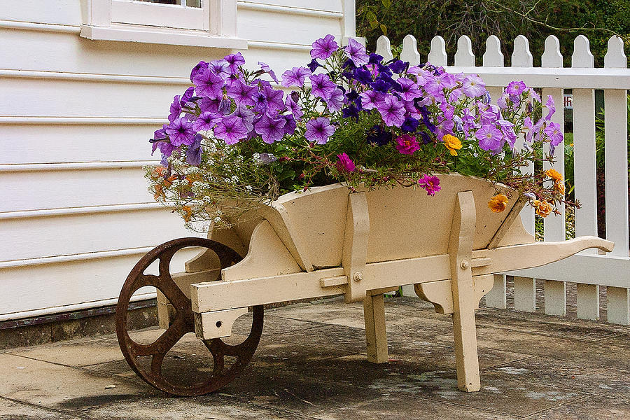 Flower Photograph - Wooden Wheelbarrow Full of Flowers by Linda Phelps