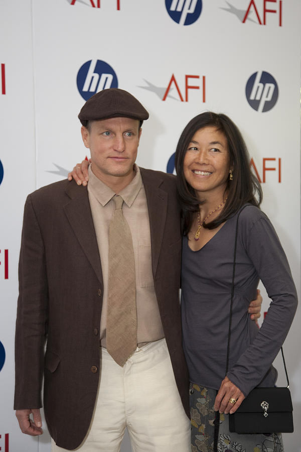 Woody Harrelson Photograph - Woody Harrelson and wife by Hugh Smith
