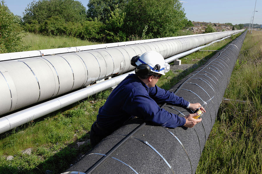 Worker Checking Gas Pipeline Photograph by Science Photo Library Worker Checking Gas Pipeline Photograph by Science Photo Library