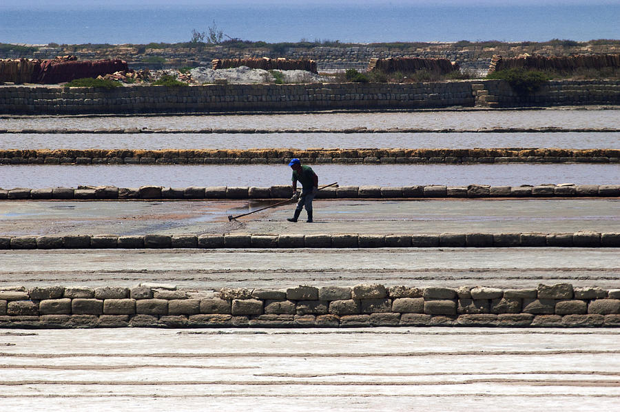 Landscape Photograph - Worker Man At The Salt Industry by Marco Battaglia