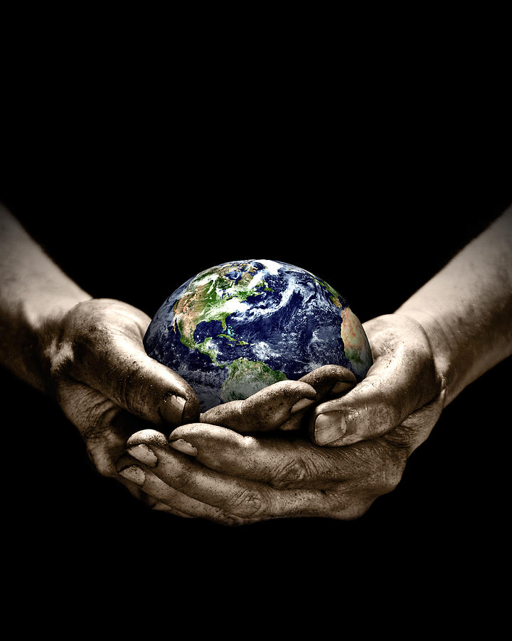 World in hands Photograph by Daneger