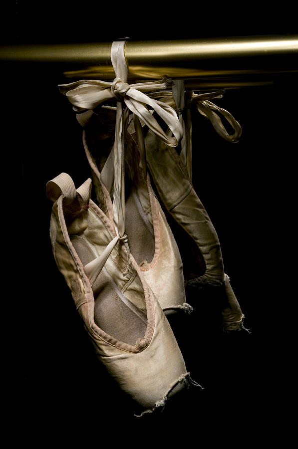 Worn Ballet Shoes Hanging on Brass Rail, Low Key Photograph by GaryAlvis