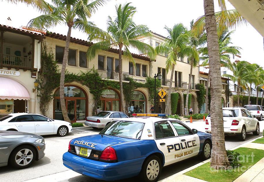 Worth Ave Palm Beach Fl facing West with police car  Photograph by Robert Birkenes