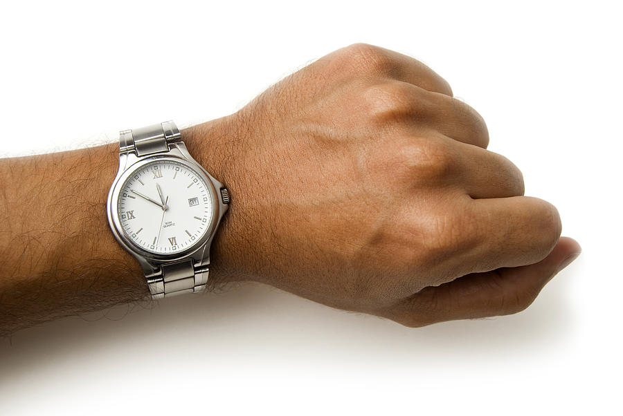 Wristwatch on a wrist - clipping path Photograph by EduLeite