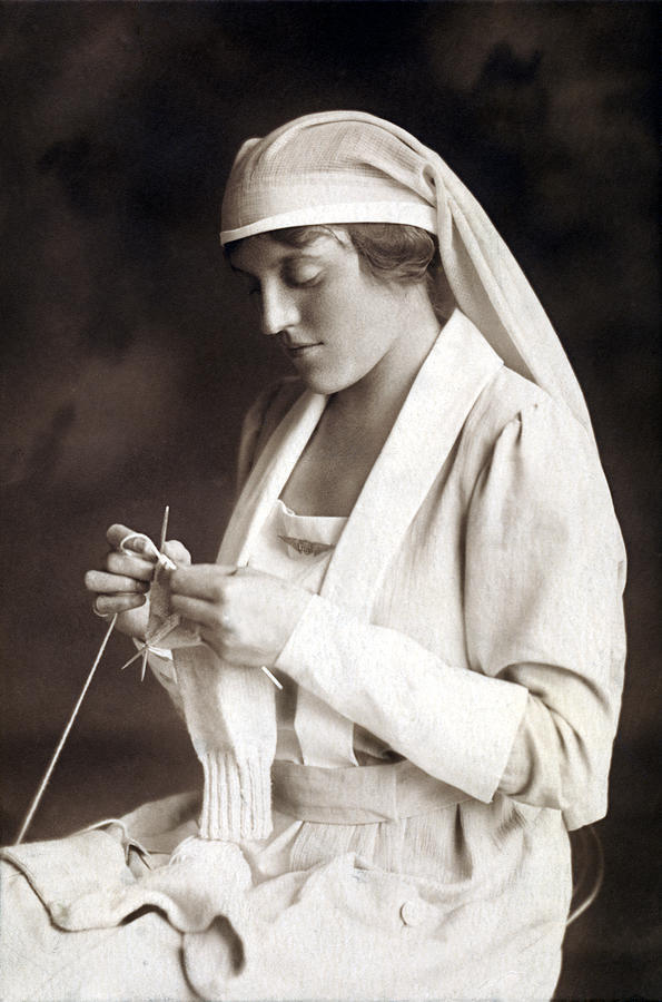 WWI Nurse knitting Sweater for Pilot Photograph by Historic Image