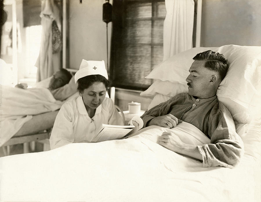 WWI Nurse Reading to Soldier Photograph by Historic Image