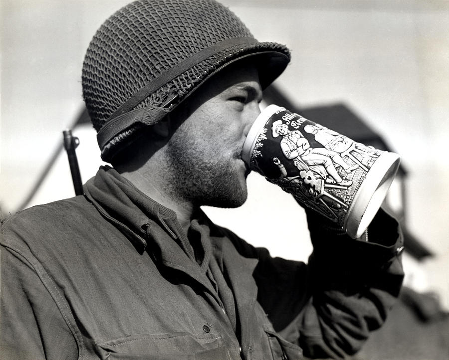 Vintage Photograph - WWII American Soldier Drinking Beer by Historic Image