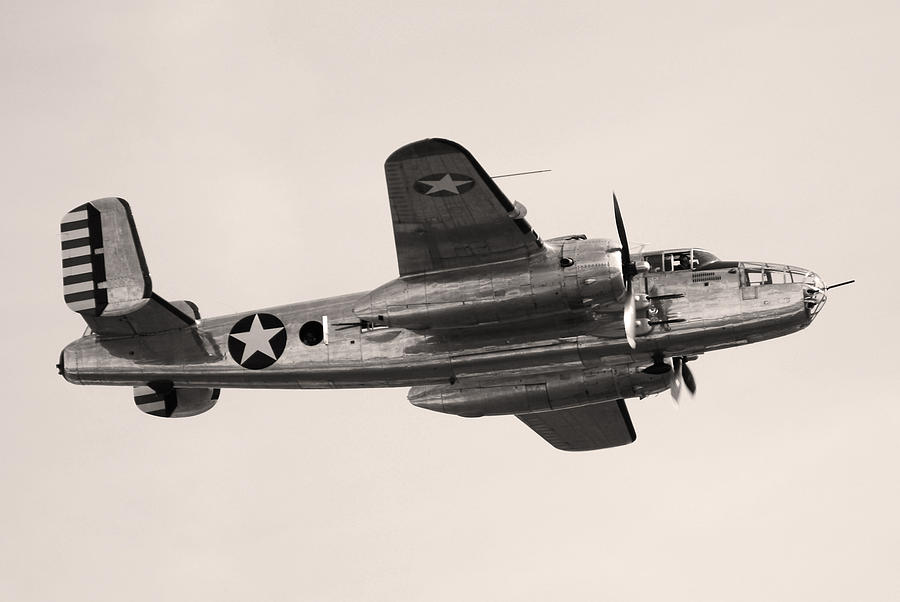 WWII bomber B25 Mitchell flying Photograph by NNehring