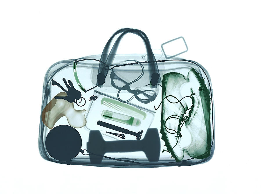 Xray image of bag containing sports equipment Photograph by Image Source
