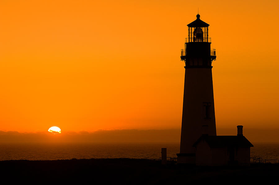 Yaquina Head Lighthouse At Sunset Photograph