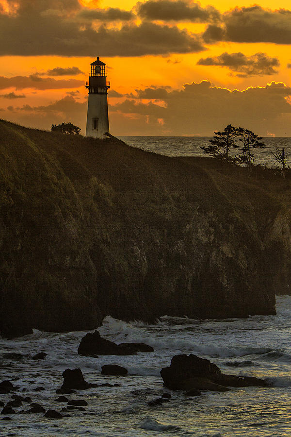 Yaquina Light at Sunset Photograph by Diana Powell