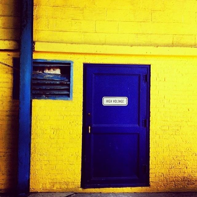 Yellow And Blue And High Voltage Photograph by Luke James Live