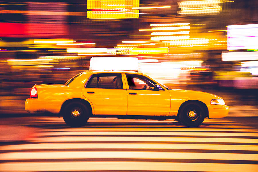 Yellow cab traffic in Times Square Photograph by LeoPatrizi