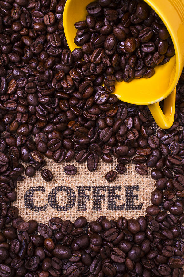 Yellow Coffee Cup With Coffee Beans Photograph by Garry Gay