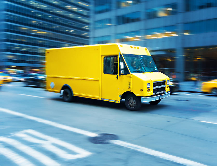 Yellow delivery truck in Manhattan Photograph by Thepalmer