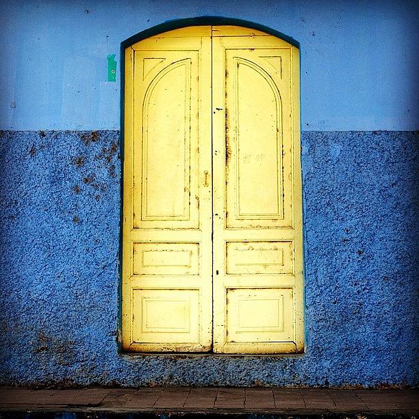 Bright Photograph - Yellow  Door and Blue Walls by Jack LaForte