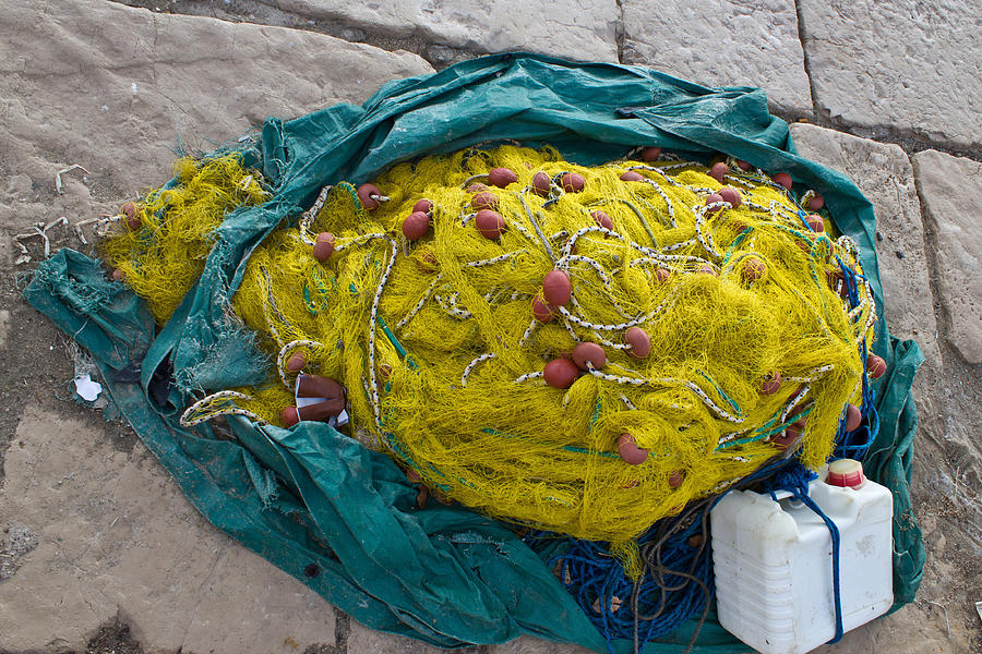 Yellow fishing nets ropes and canister Photograph by Brch Photography