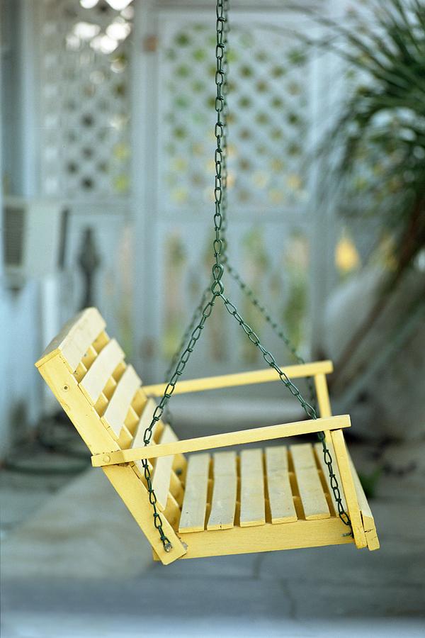 Yellow Porch Swing Photograph by John Harmon